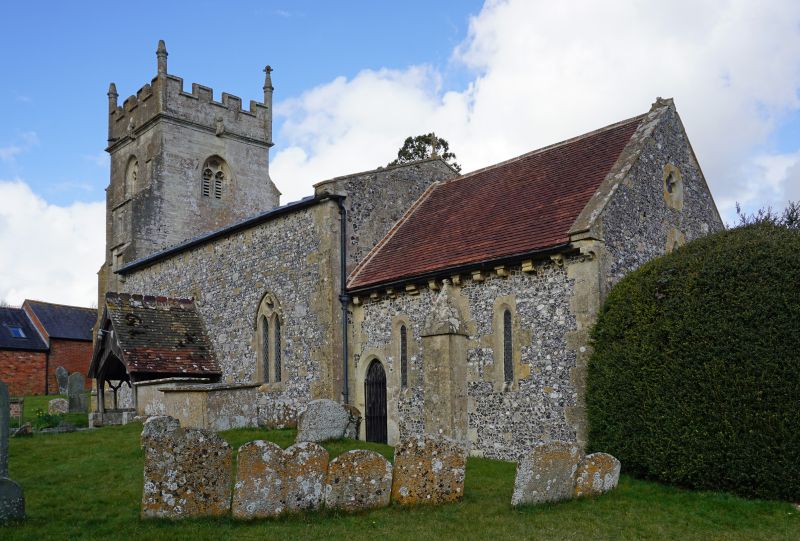 Exterior of a church, flint, square tower