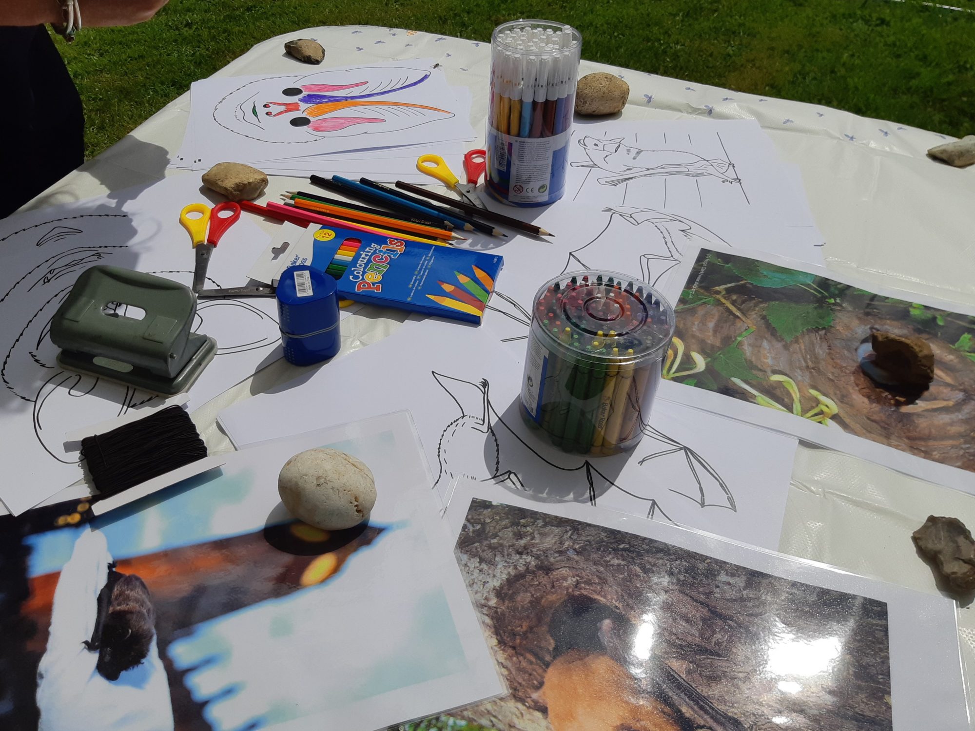 A table with activities for children at a church fete