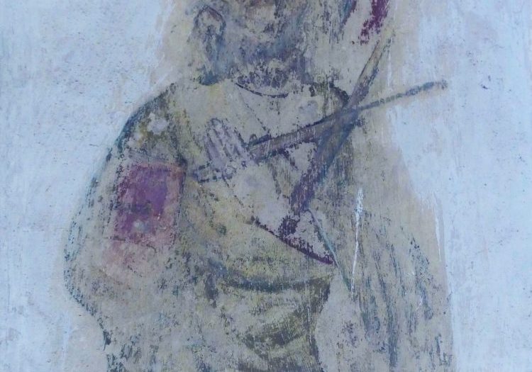 A wall painting of St Andrew, now in black red and cream, he has a red halo and holds two crossed staves
