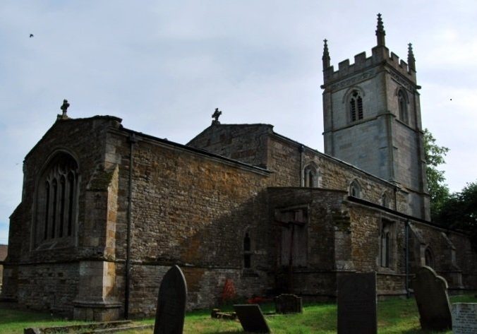 Stone church with bell tower looking from east to west