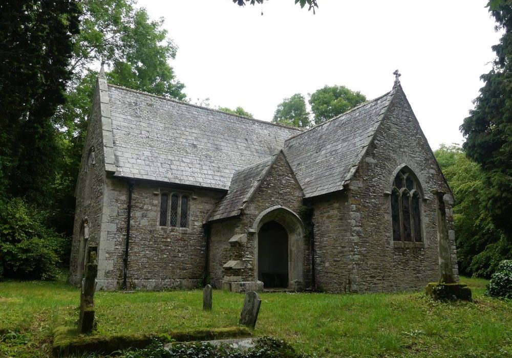 the exterior of a small stone church